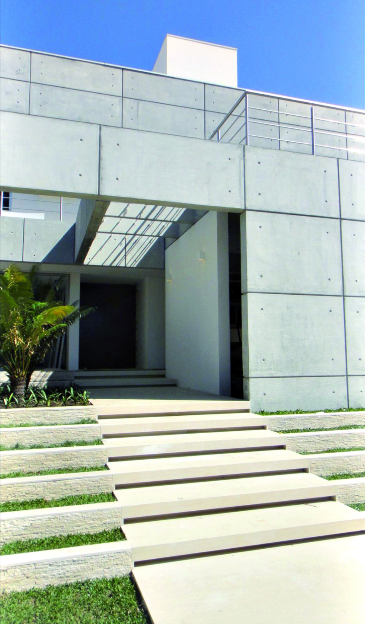 Modernidade e concreto aparente em casa projetada por Busarello. Foto: Acervo Slomp & Busarello Arquitetos