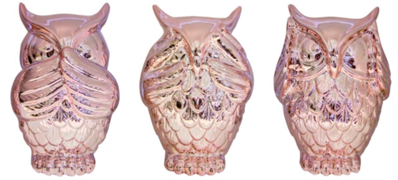 Corujas de cerâmica pintadas em ouro rosa. Na Artesanal Mais, R$ 98, cada. Foto: Divulgação<br>