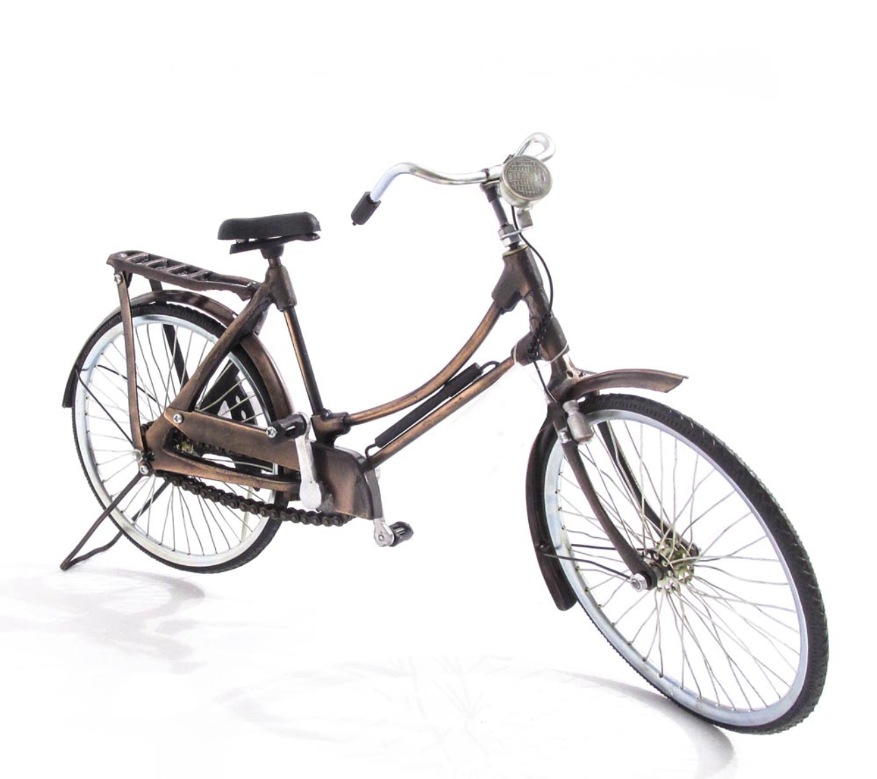 Miniatura de bicicleta em metal. Da ArtCommerce, R$ 323. 