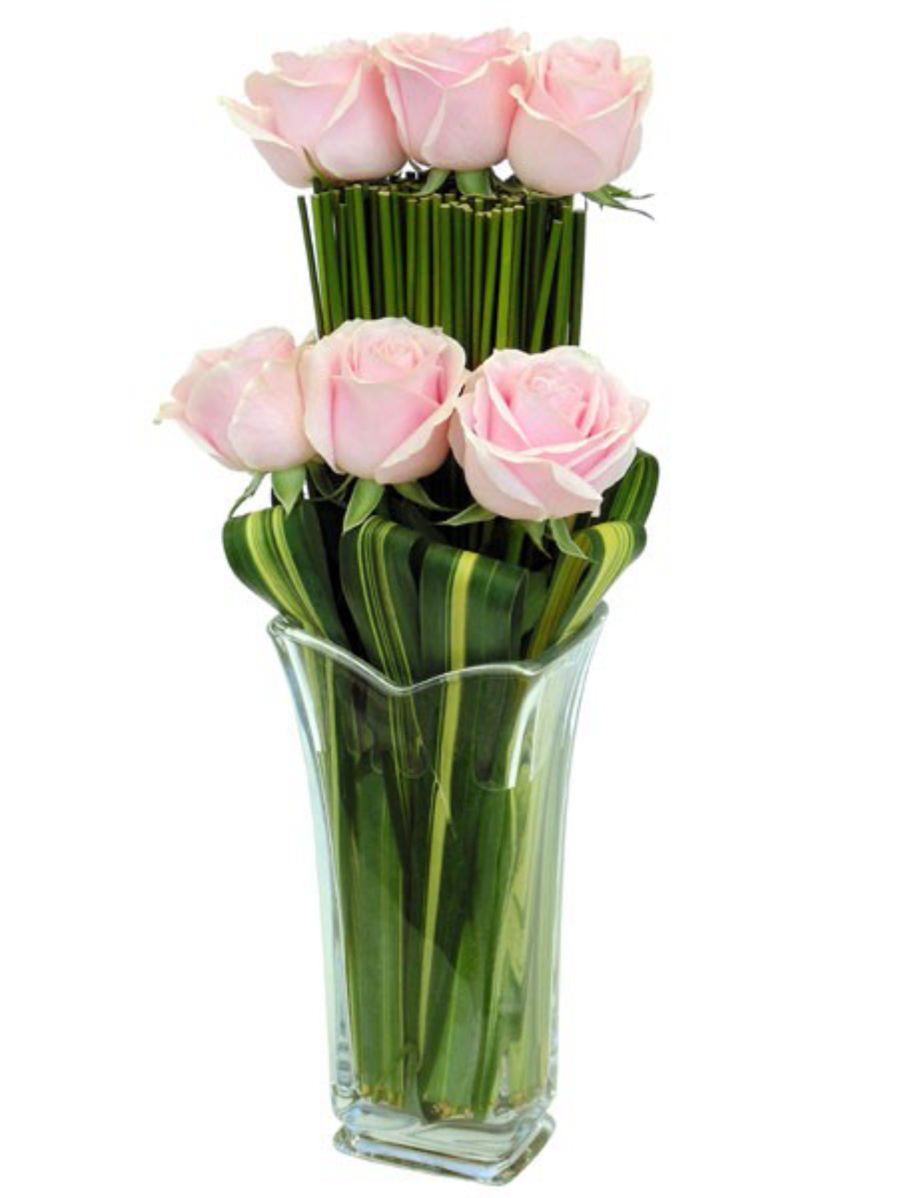 Flores não podem faltar. Coloque na mesa, ao lado da cama ou no hall. Esse arranjo com seis rosas mandul custa R$ 154 na Agapanthus.