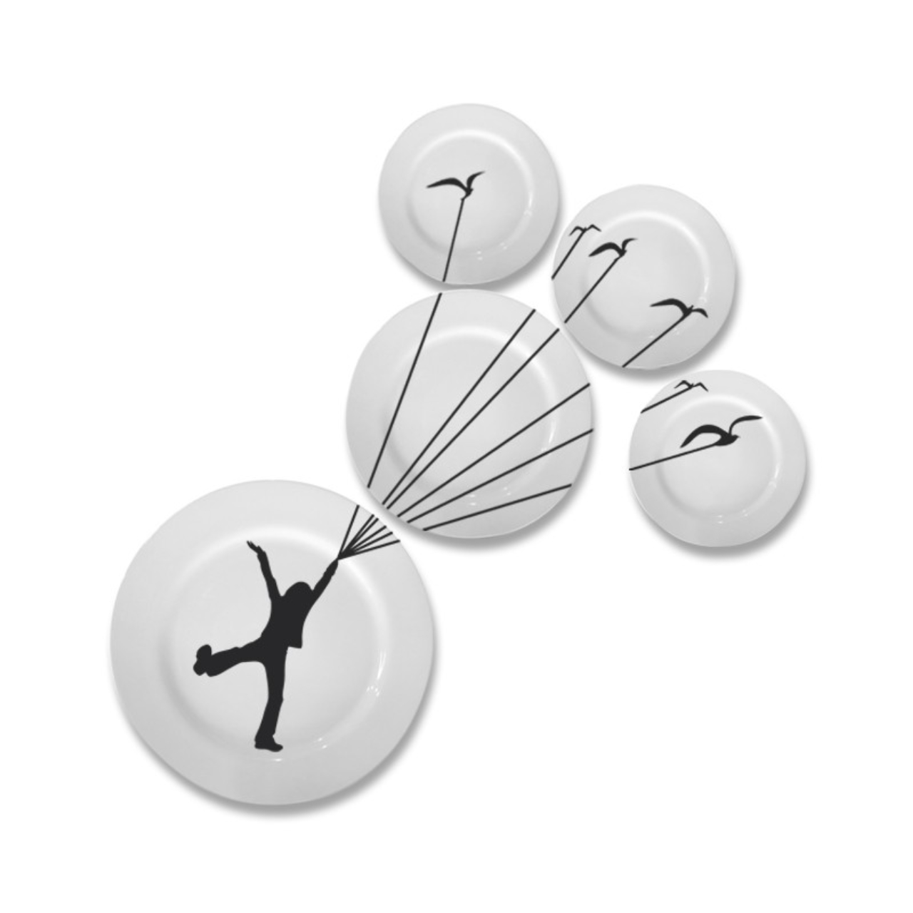 Conjunto de pratos decorativos Flying Dreams, para pendurar na parede. Na Caulim Porcelanas, R$ 129,99.