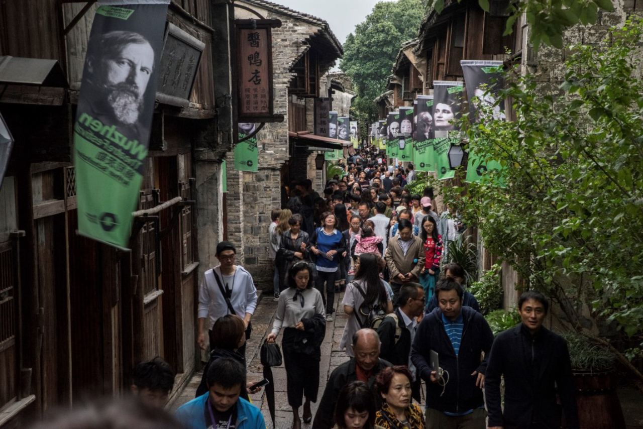 Banners promoting the annual theater festival in Wuzhen, China, Oct. 20, 2016. Wuzhen has muscled its way onto the international cultural map by hosting the Wuzhen Theater Festival, an annual event that draws tens of thousands of people to a town that sees nearly 7 million tourists a year. (Gilles Sabrie/The New York Times)