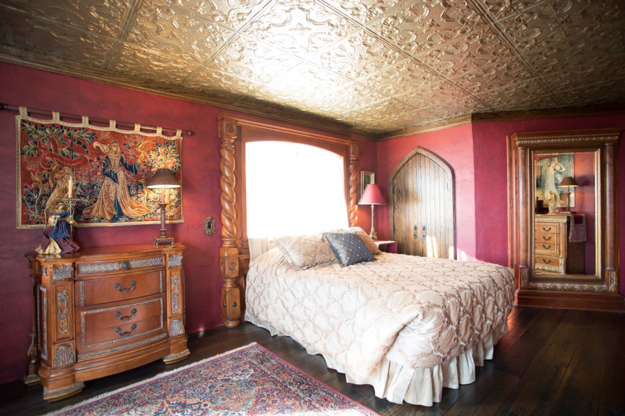 A bedroom in Highlands Castle, which is listed for sale at the price of $12.8 million, in Bolton Landing, N.Y., Jan. 26, 2017. John Lavender II took the comfort-and-fantasy approach when he built this castle, for which he put up a simple wood-frame structure and hauled in hundreds of tons of stone, putting each one in place by hand. (Nathaniel Brooks/The New York Times)
