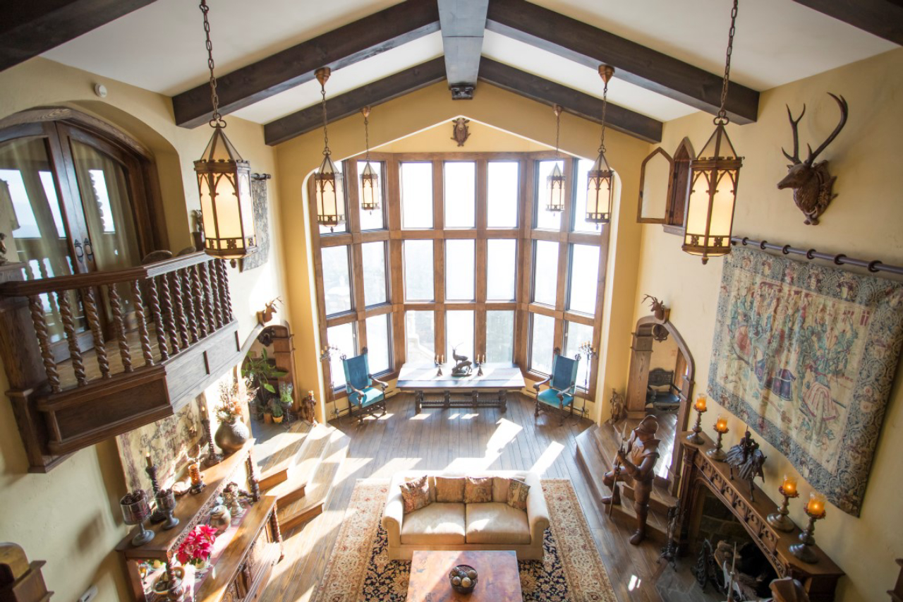 The great room in Highlands Castle, which is for sale for $12.8 million, in Bolton Landing, N.Y., Jan. 26, 2017. John Lavender II took the comfort-and-fantasy approach when he built this castle, for which he put up a simple wood-frame structure and hauled in hundreds of tons of stone, putting each one in place by hand. (Nathaniel Brooks/The New York Times)