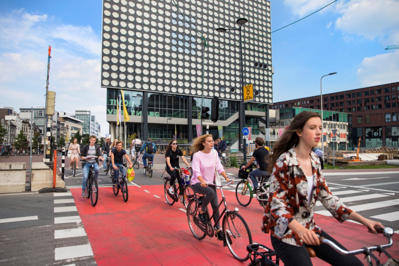 Cyclists cross an intersection near the Central Station of Utrecht, The Netherlands, Aug. 22, 2017. Utrecht is the Netherlands’ fastest growing city and also one of the world’s most bike-friendly places in one of the world’s most bike-friendly countries. (Ilvy Njiokiktjien/The New York Times)