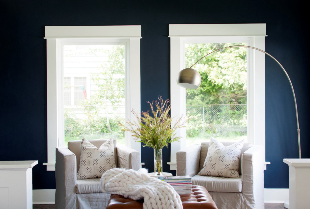 Dark and moody colors are gaining traction throughout the home. MUST CREDIT: Alexandra Crafton/Houzz