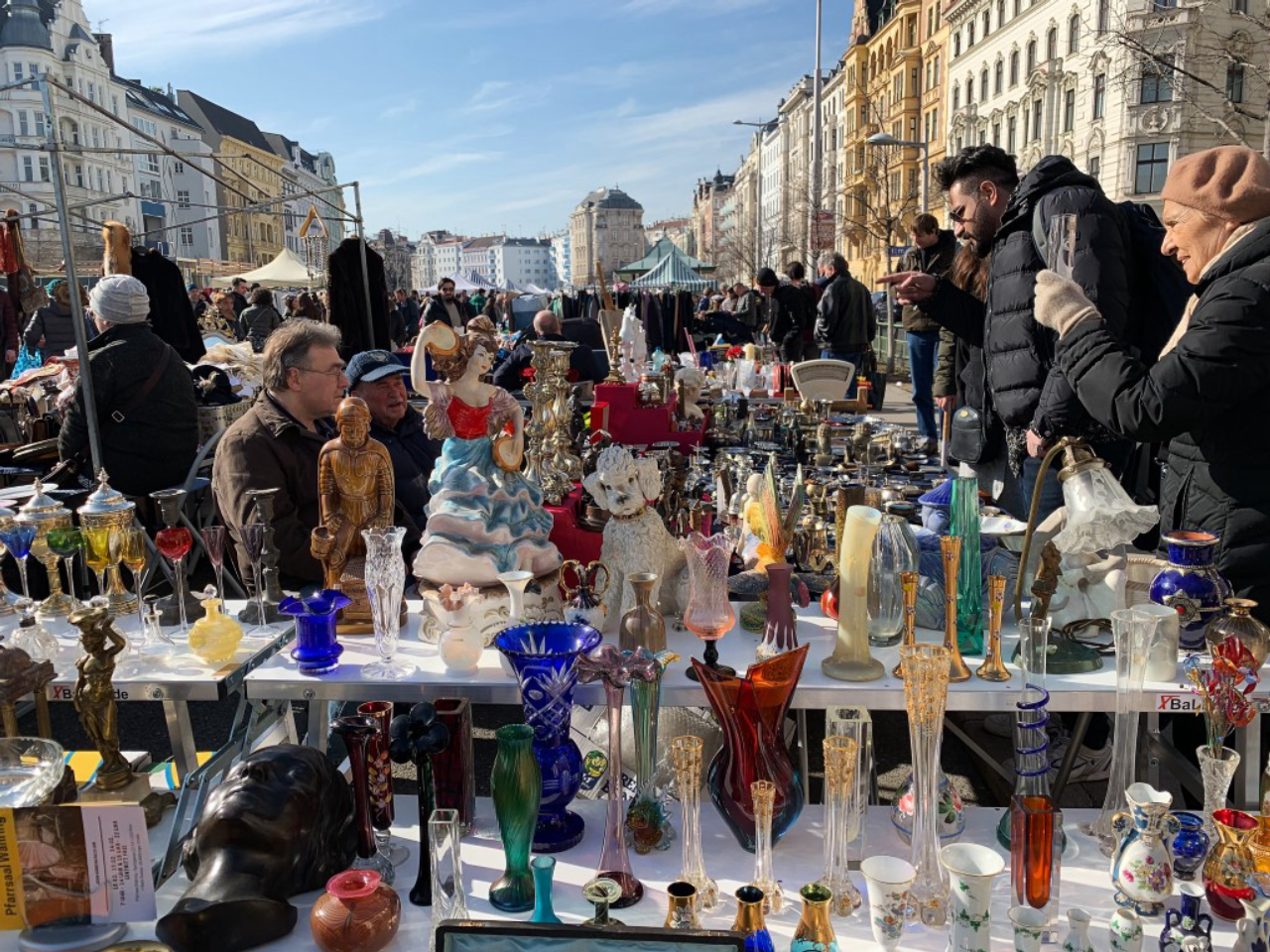 Vienna, Austria - February 16, 2018: every saturday is the biggest flea market of Vienna at the popular Naschmarkt aerea. Locals and lots of tourists are looking for bargains on this busy flea market.