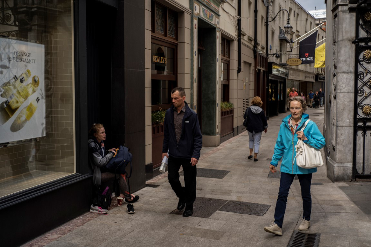 An homeless woman asks for money in central Dublin, Aug. 6, 2019. A housing shortage has made Dublin one of the world’s most expensive cities to rent in. Homelessness is up sharply, while homeownership has fallen. (Paulo Nunes dos Santos/The New York Times)