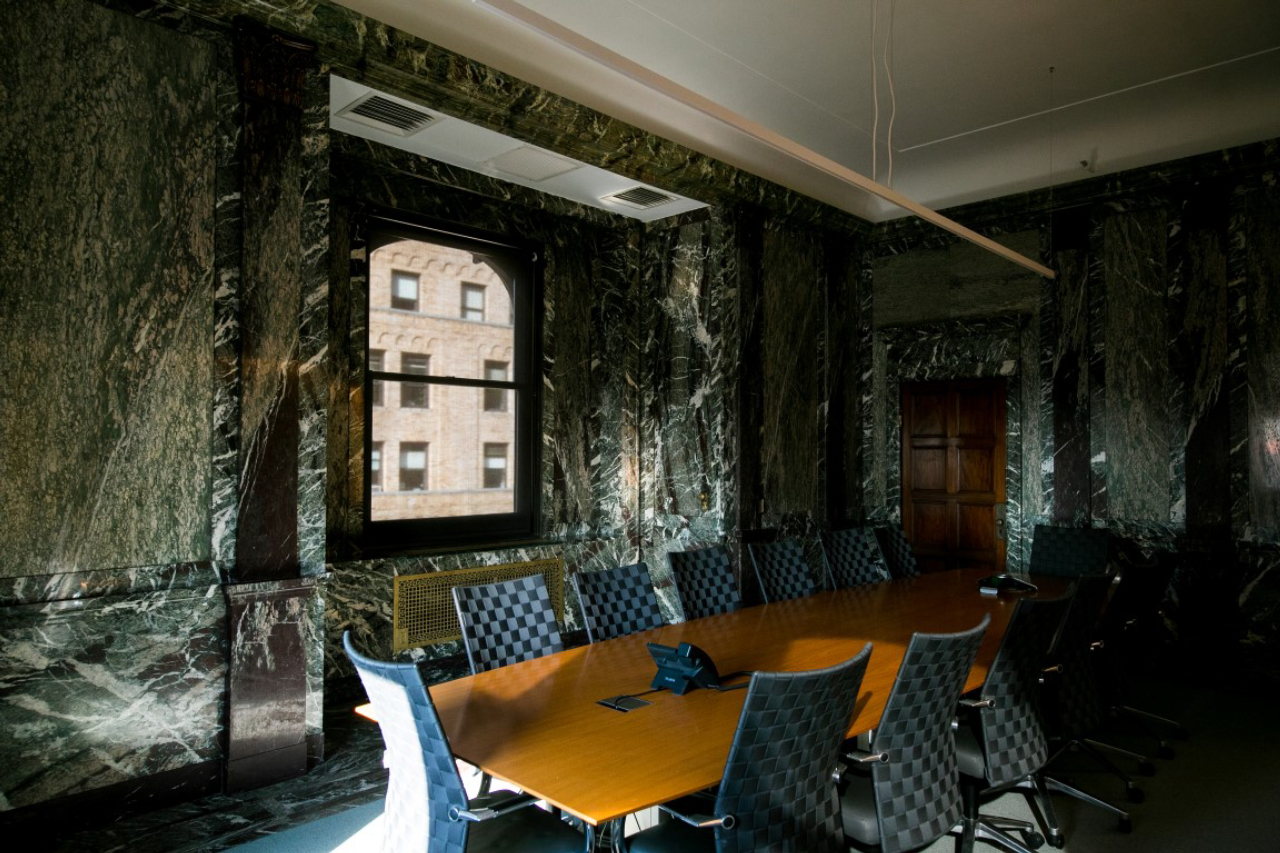 A conference room in marbled offices that once belonged to F.W. Woolworth, which architect Kang Chang restored for his firm Kang Modern, in New York, Aug. 9, 2019. Secret rooms are popping up in workplaces. (Jeenah Moon/The New York Times)