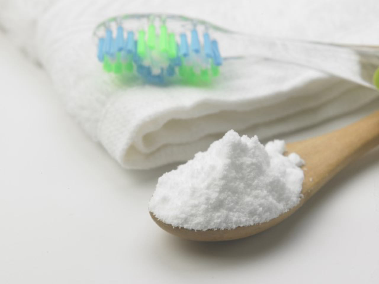 Toothbrush and baking soda to clean