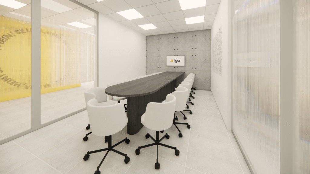 A sala de reunião, com parede em concreto aparente e iluminação adequada, favorece a concentração e a troca de ideias. Projeto: JJ Giovanella Arquitetura + Pietra Di Nizo Arquitetura.