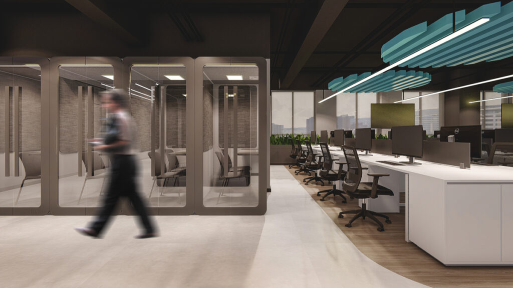 As cabines individuais oferecem privacidade para reuniões rápidas e ligações. Projeto: MYCA Arquitetura.