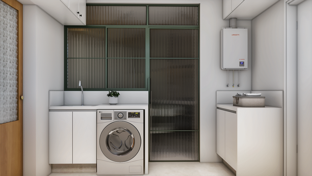 A lavanderia com armários funcionais e o armário superior na cor verde. Projeto: Estúdio KC Arquitetura.