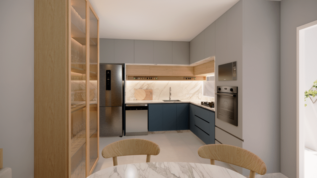 A cozinha foi integrada e modernizada com bancadas de mármore e um layout em L. Projeto: Sávio Rangel Nogueira.