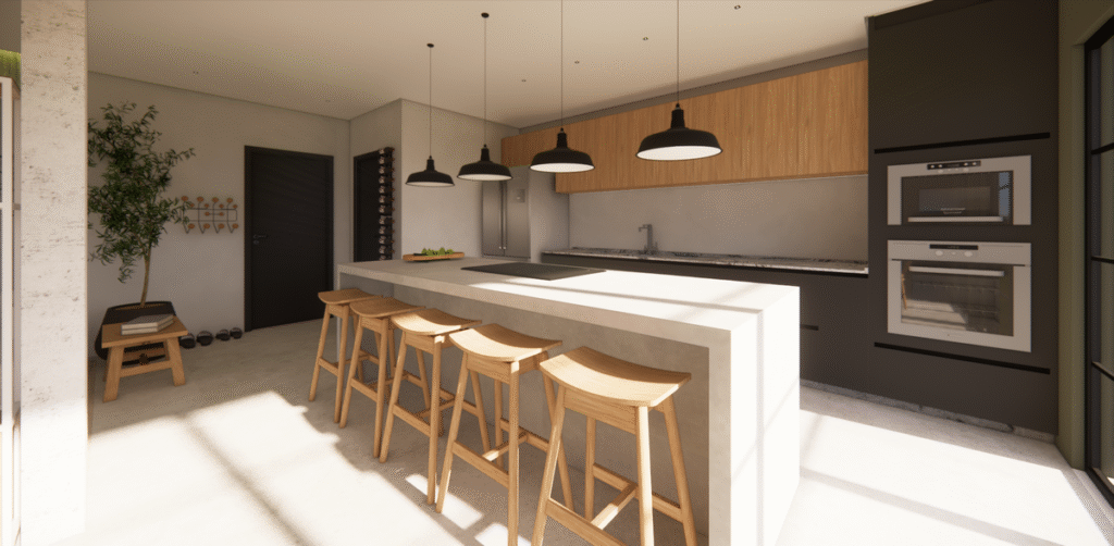 A ilha de concreto acomoda a bancada de trabalho e espaço para refeições rápidas. Projeto: JJ Giovanella Arquitetura.