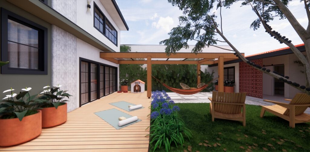 O deck de madeira e a pérgola conectam o living à área de festas, criando um ambiente multifuncional para relaxar e praticar yoga. Projeto: JJ Giovanella Arquitetura.