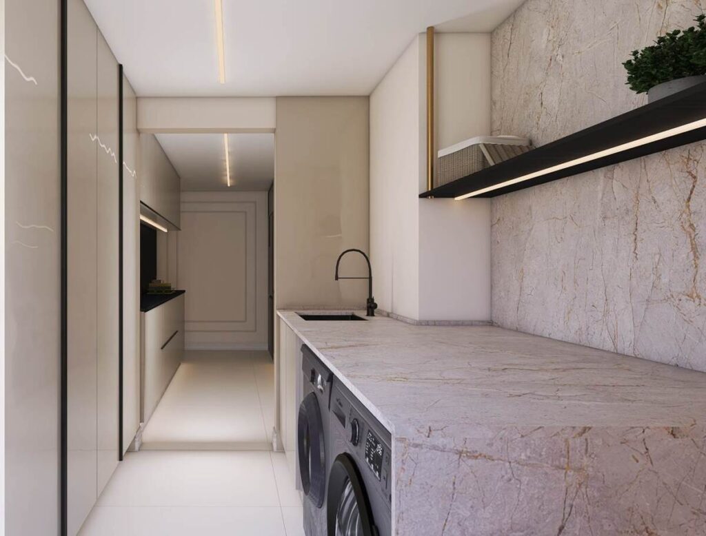 A área de serviço prioriza o armazenamento e a organização dos equipamentos. Projeto: Alana Koster.