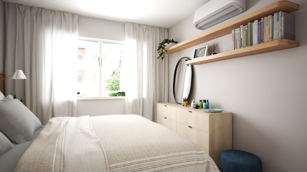 As texturas neutras e a iluminação natural criam um refúgio acolhedor no quarto. Projeto: Isabela Cardoso Arquitetura.