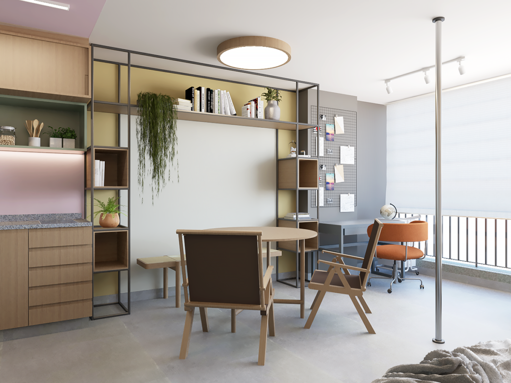 A estante de nichos coloridos e a mesa de trabalho próxima à luz natural. Projeto: Giovanna Fusaro Arquitetura e Interiores.