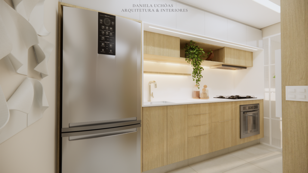 Marcenaria planejada e iluminação funcional tornam a cozinha um ambiente prático. Projeto: Daniela Uchôas Arq. e Interiores.