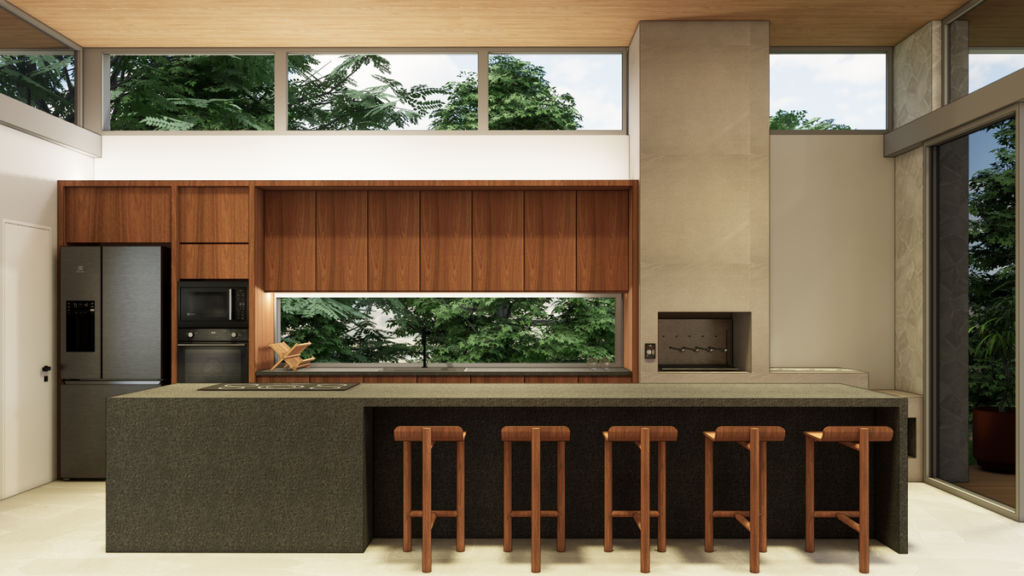 Cozinha ampla com iluminação zenital e conexão com a área externa. Projeto: TEVA Arquitetura.